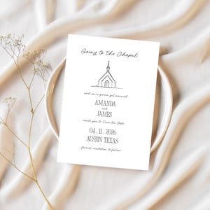 May include: A white wedding invitation card with the text "Going to the Chapel" and a line drawing of a chapel. The card also includes the names "AMANDA and JAMES", the date "04.11.2026", and the location "AUSTIN TEXAS".