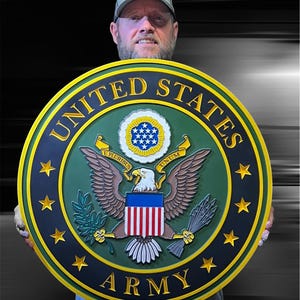 May include: A green and gold round sign with the words "United States Army" and a bald eagle with a shield and a wreath. The eagle is holding arrows in its talons and an olive branch in its beak.