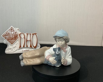 Boy with dog, NAO by Lladro