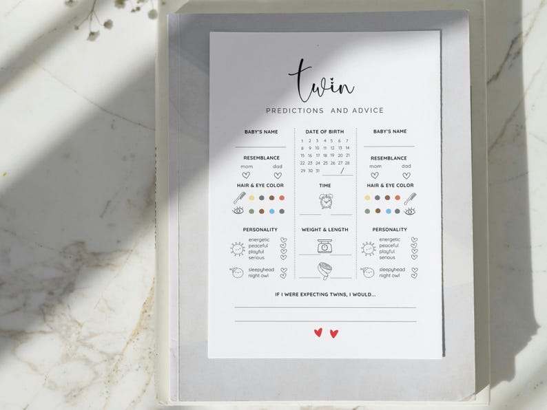 May include: A printable twin prediction chart with sections for baby's name, date of birth, resemblance, hair and eye color, personality, weight and length, and time. The chart includes icons for each category and a space for writing in predictions. The text at the bottom reads "If I were expecting twins, I would..."