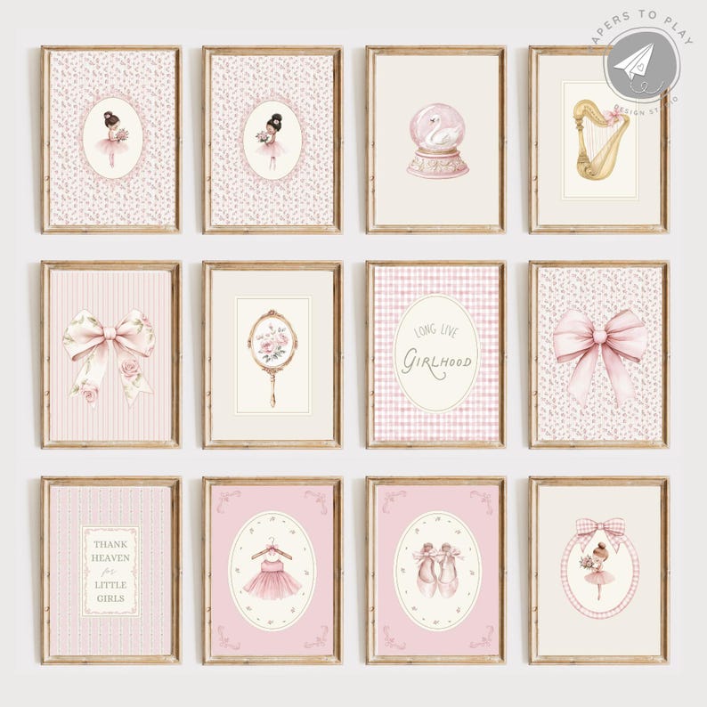 May include: A collection of twelve framed art prints with a soft, feminine theme. The prints feature illustrations of ballerinas, bows, a harp, a snow globe, and the text "Long Live Girlhood" and "Thank Heaven for Little Girls". The color palette is primarily pink and beige.