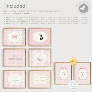 May include: A collection of framed art prints in a soft pink color scheme. The prints feature various designs, including a butterfly, swans, and text such as "Sisterhood" and "Long Live Girlhood." Includes alphabet letters A-Z. The art is suitable for a nursery or children's room.