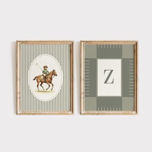 May include: Two framed prints. One features a polo player on a horse in an oval frame against a striped background. The other has a large letter "Z" on a plaid background. Both are in wooden frames.
