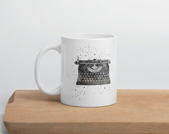 White glossy mug with watercolor illustration of a typewriter