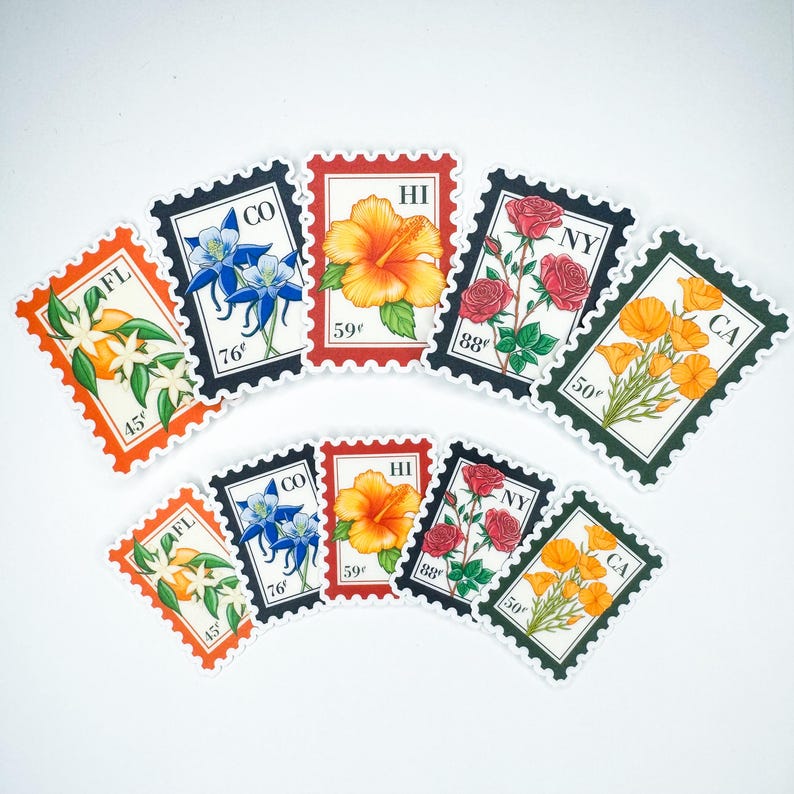 May include: A collection of floral-themed stickers resembling postage stamps. Each sticker features a different state flower, including orange blossoms, columbines, hibiscus, roses, and California poppies. The stickers have a white background and are outlined in various colors.