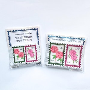 May include: A set of three ceramic nesting bowls in shades of blue, green, and white. The bowls feature a speckled glaze and a simple, modern design. The largest bowl measures approximately 6 inches in diameter.