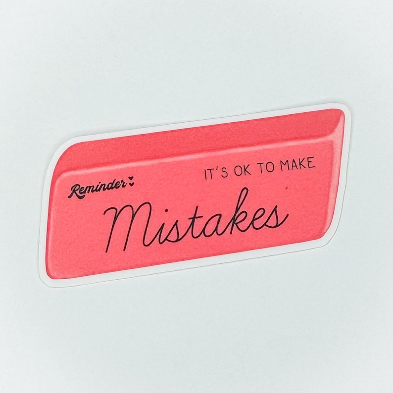 May include: Pink eraser sticker with a white border. It reads "Reminder: It's OK to make Mistakes".