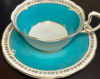 Vintage Aynsley Baby Blue Theekopje en Schotel Bone China Engeland Goud