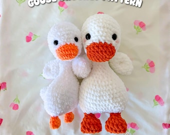 May include: Two white crochet geese with orange beaks and feet are displayed on a floral patterned background. The text "GOOSE CROCHET PATTERN" is at the top. The text "Digital PDF download: by crochetcalls." is at the bottom.