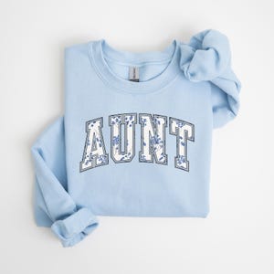 Sudadera de tía, camiseta de tía, regalo para tía, camiseta de tía con letras universitarias, anuncio de nuevo bebé, sudadera floral para tía, regalo para cuñada