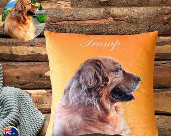 May include: A custom orange pillow with a golden retriever dog printed on it. The dog is looking to the right and has its mouth slightly open. The pillow has the word "Trump" printed in white cursive on the top.