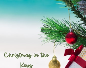 May include: A green artificial Christmas tree branch decorated with a shiny red ornament, a glittery gold ball ornament, and a silver pinecone. A white gift box with gold polka dots and a red ribbon sits below. The text reads Christmas in the Keys.
