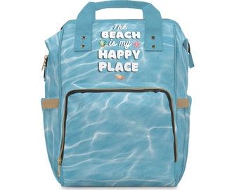 The Beach est mon sac à dos fourre-tout Happy Place. Sac à dos parfait pour tous les jours ou pour votre amoureux de la plage préféré !