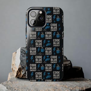 May include: Black phone case with a repeating pattern of the words "CODE BLUE ENERGY" in white and blue. The design includes lightning bolts, coffee cups, and heart symbols. The phone case is displayed on a stone surface.