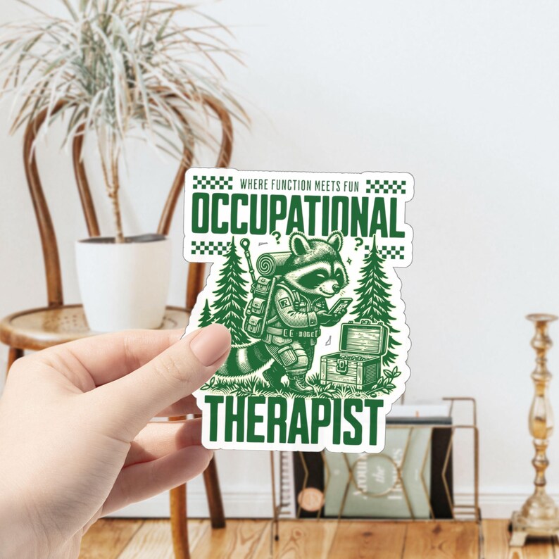 May include: Green and white sticker with a raccoon wearing a backpack and holding a phone. The text reads "Where function meets fun Occupational Therapist".