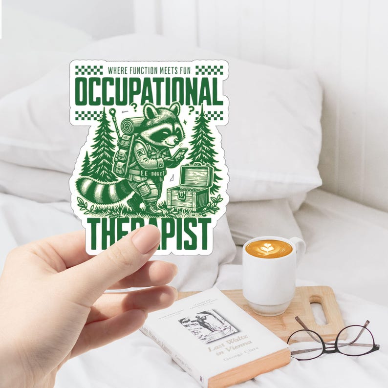May include: Green and white sticker with a raccoon wearing a backpack and holding a phone. The text on the sticker reads "Where function meets fun Occupational Therapist".