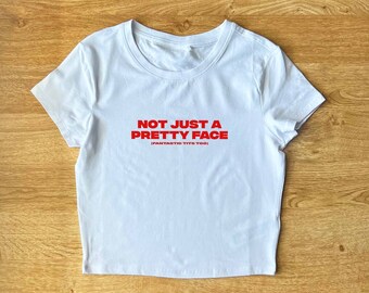 Not Just A Pretty Face, Fantastic Tits Too - Y2K Baby Tee | Y2K Slogan Tee, Baby Tee, Cropped T-Shirt, Funny Shirt, 80s, 90s, 2000s Tee