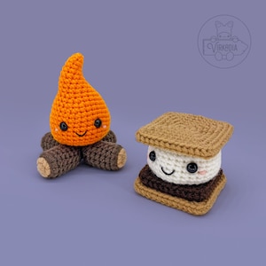 May include: A crocheted campfire with orange flames and brown logs, and a crocheted s'more with brown graham crackers, a white marshmallow, and a brown chocolate bar.