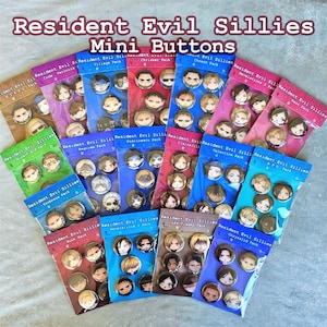May include: A collection of Resident Evil Sillies Mini Buttons packaged in individual clear plastic sleeves. Each sleeve contains multiple circular pin-back buttons featuring stylised cartoon illustrations of various characters from the game series.