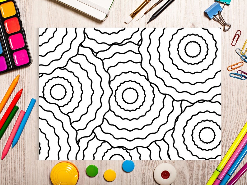 May include: A black and white coloring page with a repeating pattern of wavy circles. The page is surrounded by art supplies, including crayons, paint, and a pencil.