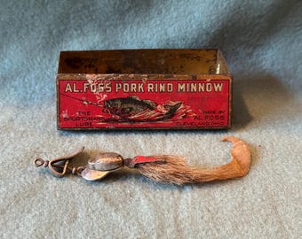 Vintage Al Foss Pork Rind Minnow lure with tin