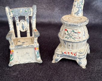 Vintage rocking chair and potbelly stove, salt, and pepper shakers