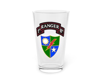 May include: A clear glass pint glass with a green, blue, and white shield design and the text "1ST RANGER BN" in a red and black ribbon.