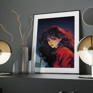 May include: A framed print of a woman with long black hair and red lipstick. She is wearing a red jacket and looking to the side. The print is on a dark grey wall with two lamps and a vase with branches on a black shelf.