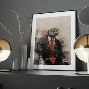 May include: A framed print of a painting depicting a turtle wearing a suit and a red tie. The painting is on a dark grey wall with two lamps and a vase with branches on a black shelf.