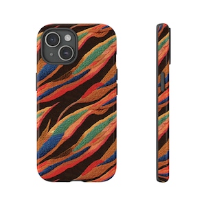 May include: A black phone case with a colorful abstract pattern of orange, red, blue, and green. The pattern resembles a stylized feather design.