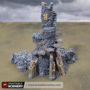 May include: A miniature ruined stone tower with grey masonry, brown wooden platforms, and tan architectural accents. The structure features a central cylindrical tower with crumbling walls, attached debris, and the text PRINTABLE SCENERY.