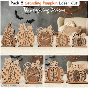 Può includere: Una collezione di cinque decorazioni a forma di zucca in legno tagliate al laser. Le zucche presentano vari disegni, tra cui motivi a griglia e dettagli di foglie. Una zucca ha la scritta "Autumn" incisa. Il testo "Pack 5 Standing Pumpkin Laser Cut" è visibile.