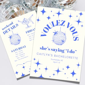 May include: Two cards with a disco ball theme. The top card says "Voulez Vous" in blue text with a disco ball graphic. The bottom card says "Weekend Details" with a schedule of events for a hen party. The text on the cards is in blue.