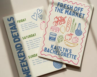 May include: Two cream-colored cards with text and illustrations. One card says "Weekend Details" and lists a schedule. The other says "Fresh Off The Market" with food illustrations and "Kaitlyn's Bachelorette".