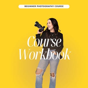 May include: A yellow background with the text "BEGINNER PHOTOGRAPHY COURSE" and "COURSE WORKBOOK" in white. A person is holding a camera. The person is wearing a black top, blue jeans, and black boots.
