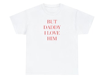 May include: White t-shirt with the red text "BUT DADDY I LOVE HIM" in a stacked format. The shirt has a crew neck and short sleeves. The fabric appears to be a soft cotton blend.