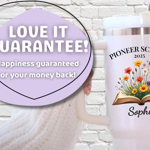 May include: White tumbler with a handle, featuring the text "PIONEER SCHOOL 2025" and a floral design above the name "Sophie." A light purple oval with the text "LOVE IT GUARANTEE!" is in the background.
