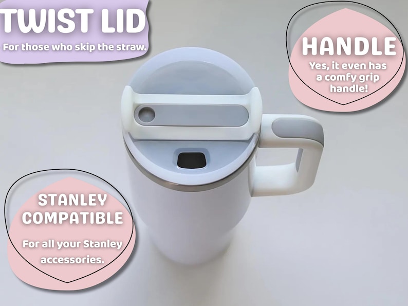 May include: White insulated mug with a gray twist lid and handle. The mug is Stanley compatible and features a comfy grip handle. Text on the image reads "TWIST LID" and "HANDLE".