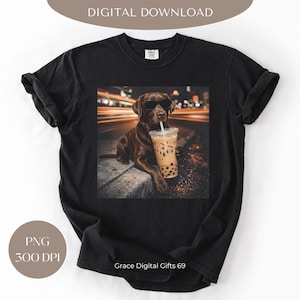 May include: Black t-shirt with a graphic of a brown Labrador wearing sunglasses and holding a bubble tea. The image has a blurred background of city lights. Text on the shirt reads "DIGITAL DOWNLOAD" and "PNG 300 DPI".