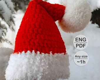 May include: Red and white crocheted Santa hat with a white pom-pom. The hat is made with a fluffy white yarn for the brim and pom-pom. The pattern is available in English PDF format. Any size. Approximately 1 hour to complete.