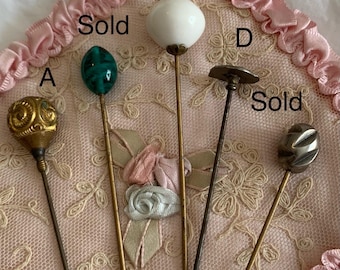 Alfileres de sombrero antiguos procedentes de Gran Bretaña