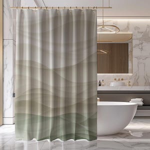 May include: A shower curtain with a wavy abstract design in shades of beige, brown, and green. The curtain is hung in a bathroom with a white bathtub and a marble countertop.