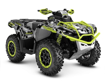 May include: A black and green Can-Am Outlander 800 ATV with a black and white chequered graphic design. The ATV has a roll cage, a front bumper, and a rear rack. The ATV is sitting on a white background.