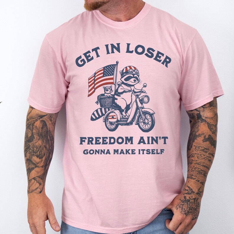 Funny Patriotic Raccoon Comfort Colors T-Shirt: 4th of July Gift Blossom