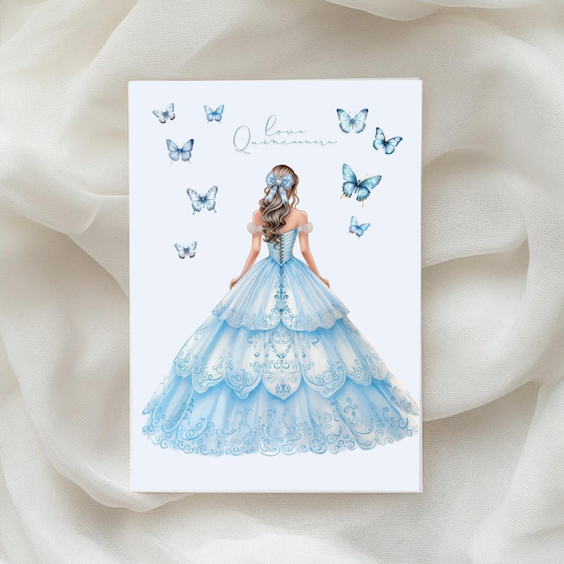 May include: A rectangular card featuring a watercolor illustration of a woman in a light blue ball gown. The card is adorned with blue butterflies and the text "Love Quincea&ntilde;era" in cursive.