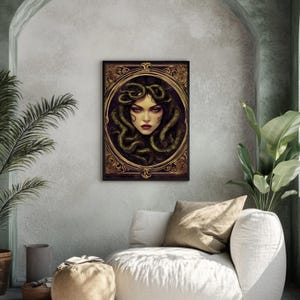 May include: A digital illustration of a woman's face with snakes for hair. The woman has dark hair and eyes, and she is looking directly at the viewer. The background is a dark purple with a gold frame.