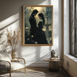 May include: A framed artwork depicts a romantic scene of a couple in a gothic garden. The man and woman are dressed in black attire, standing near a fountain. The artwork is set in a gold frame, adding a touch of elegance to the scene.