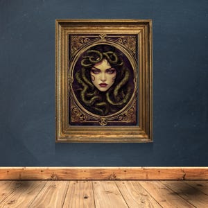 May include: A framed illustration of a woman with snakes for hair. The woman has a serious expression and is looking directly at the viewer. The frame is gold and has ornate details.