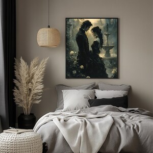 May include: A framed artwork depicts a romantic scene of a couple in Victorian attire, set in a garden with a fountain. The artwork is displayed above a bed with gray bedding, pillows, and a white throw blanket. A woven pendant light hangs from the ceiling.