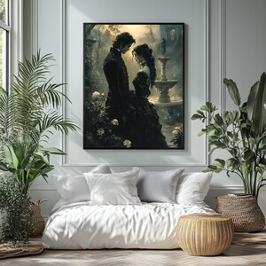 May include: A framed artwork depicts a romantic scene of a couple in formal attire, standing close together in a garden setting. The artwork features a fountain and white roses, with a dark color palette. The artwork is displayed above a bed with white bedding.